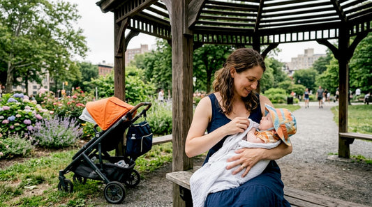 Mother shielding baby from sun outdoors